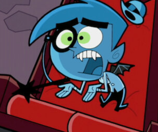 Timmy azul com aparência de vampiro sentado num sofá vermelho